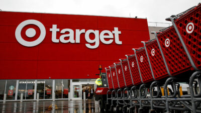 Shoping carts are wheeled outside a Target Store in Brooklyn, New York, U.S., November 26, 2021. REUTERS/Brendan McDermid