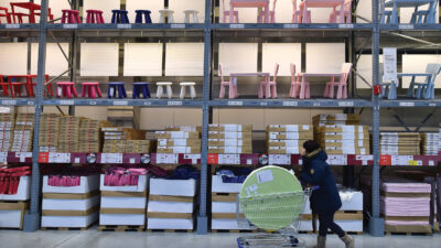 A shopper looks around in a store of Ikea in Gwangmyeong, south of Seoul, on December 18, 2014. Global furniture giant Ikea opened its first store in South Korea a much-anticipated market entry that has stumbled at a number of commercial and cultural hurdles along the way. AFP PHOTO / JUNG YEON-JE        (Photo credit should read JUNG YEON-JE/AFP via Getty Images)