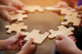 Jigsaw puzzle pieces group together, unite strength, unity, teamwork. communication connection teamwork concept