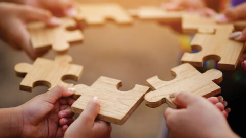 Jigsaw puzzle pieces group together, unite strength, unity, teamwork. communication connection teamwork concept