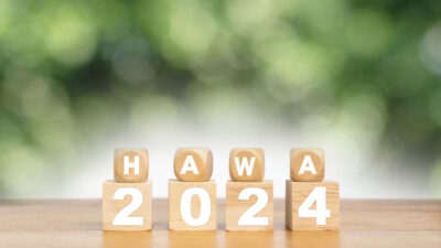 Wooden Cube turns from 2022 to 2023 on wooden table,Happy new 2023 year, countdown and New Year holiday concepts.
